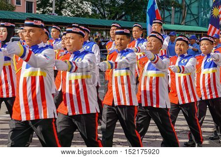 Kota Kinabalu,Sabah-Aug 31,2016:Malaysian wearing Malaysian flag themed uniform costume to celebrating the Malaysia National Day at Kota Kinabalu,Sabah,Borneo,Malaysia on 31st Aug 2016.