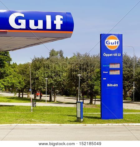 Sodertalje, Sweden - June 21, 2013: Signs at the Gulf gas station at Brolundavagen.