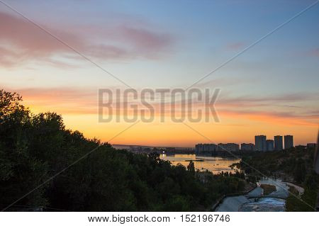 Sayran lake - evening city view Almaty Kazakhstan