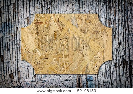 A Wooden Nameboard on the Wooden Fence
