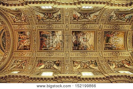 ROMA ITALY APRIL 11 2016: The fresco in the cupola of church Basilica di Sant Andrea della Valle by Giovanni Lanfranco (1621- 1625) and four Evangelists by Carracci school (17. cent.).