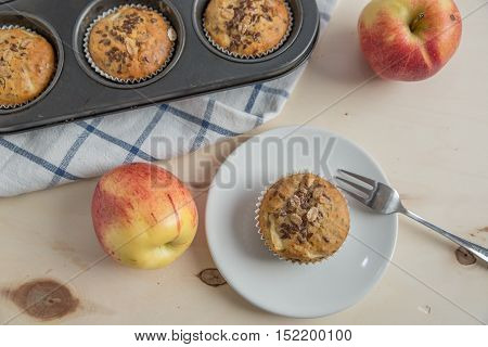 home made bircher mueseli apple muffins on a table