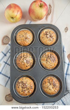home made bircher mueseli apple muffins on a table