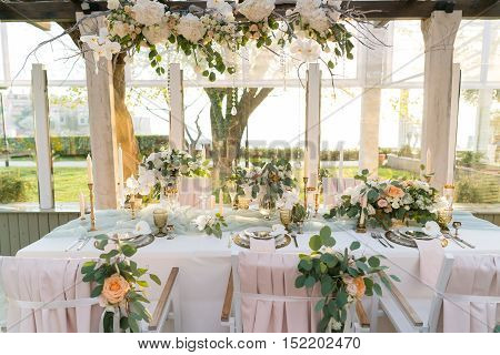 beautifully decorated table with flowers for wedding party