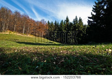 Meadows, forests and rolling hills in autumn, Bobija mountain, west Serbia