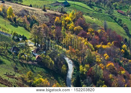 Aerial view of meadows and rolling hills in autumn, Bobija mountain, west Serbia