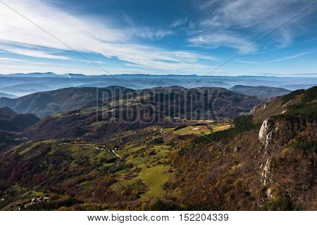 Aerial view of meadows and rolling hills in autumn, Bobija mountain, west Serbia
