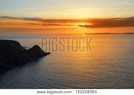 beautiful serene sunset over loop head with the ballybunion coast on the wild atlantic way in ireland