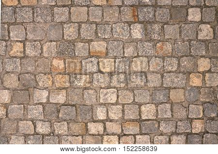 Old outdoor building stone wall. Rustic background.