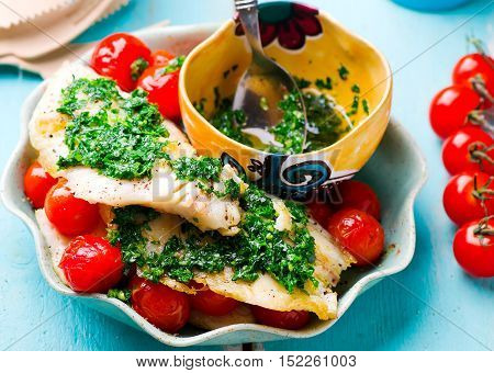 Lazy Fish.fried tilapia fillet with tomato.seletive focus