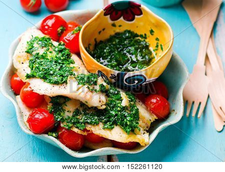 Lazy Fish.fried tilapia fillet with tomato.seletive focus