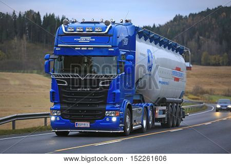 SALO, FINLAND - OCTOBER 15, 2016: Blue Scania R620 truck of Scandinavian Finbulk and jumbo semi tank trailer of 91 cubic meters for transporting extra light materials on the road in South of Finland.