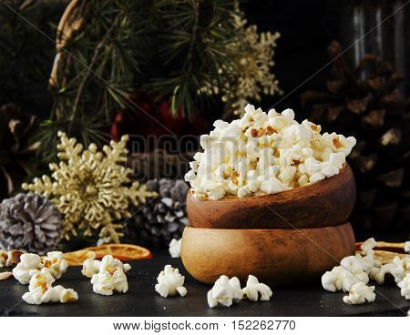 Popcorn In A Wooden Plate On The Background Of Christmas
