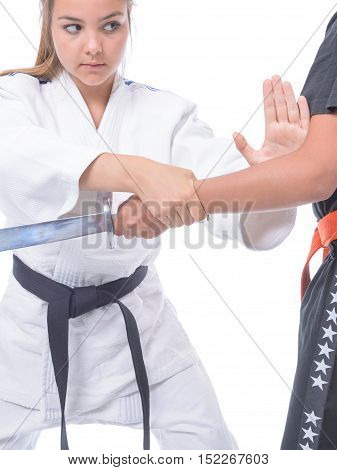 Young athlete exercising with a partner in self-defense.