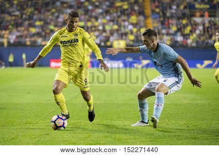 VILLARREAL, SPAIN - OCTOBER 16th: Dos Santos with ball during La Liga soccer match between Villarreal CF and R.C. Celta de Vigo at El Madrigal Stadium on October 16, 2016 in Villarreal, Spain