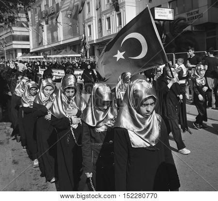 Istanbul Turkey - October 11 2016: Muslims worldwide marks Ashura Istanbul Shiite community. Caferis take part in a mourning procession marking the day of Ashura in Istanbul's Halkali region Turkey on October 11 2016. 
