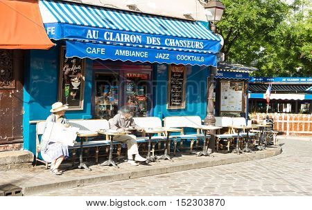 Paris France-July 09 2016: The traditionnal French cafe Au clairon des chasseurs located in picturesque Montmartre district of Paris.