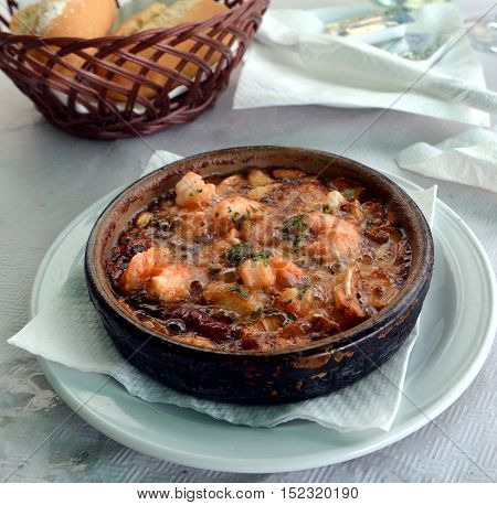 Sizzling prawns with garlic. Traditional Spanish tapas dish.