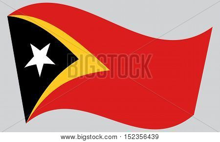 East Timorese national official flag. Patriotic symbol banner element background. Correct colors. Flag of East Timor waving on gray background vector