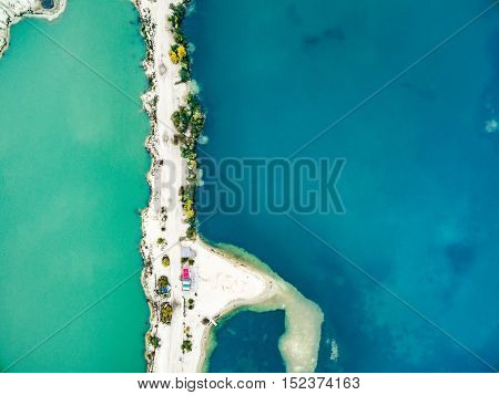 Aerial view - sandy shore and green and blue water