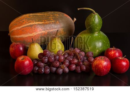 fruits on a dark background, studio picture