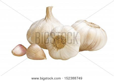 Three heads of garlic on a white background