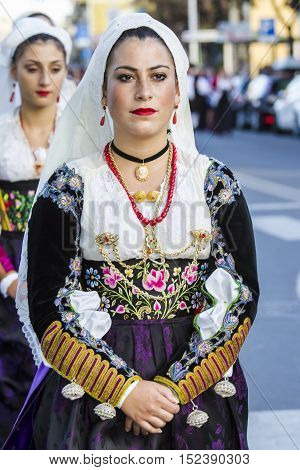 QUARTU S.E., ITALY - September 17, 2016: Parade of Sardinian costumes and floats for the grape festival in honor of the celebration of St. Helena. - Sardinia - Folk group Santa Rughe from Uri