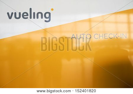 BARCELONA, SPAIN - CIRCA NOVEMBER, 2015: vueling sign at Barcelona Airport. Barcelona-El Prat Airport is an international airport. It is the main airport of Catalonia, Spain.