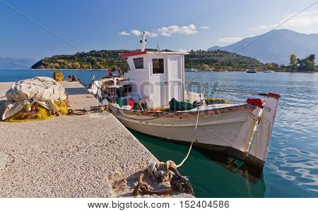 Traditional Greek fishing boat at Archaia Epidaurus harbor, Greece