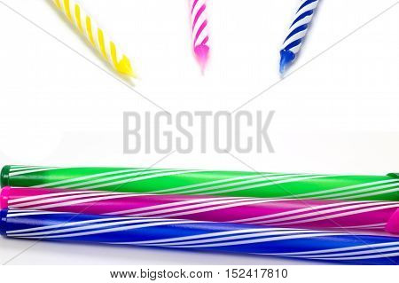 Happy birthday candle and Colorful pen on white background