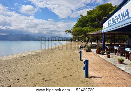 Marathon Greece - Oct 01 2016: Outdoor cafe on the beautiful Schinias sandy beach one from most popular beach in Attica
