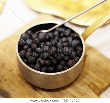 Bowl of bilberries or blueberries, Healthy food Bilberries in a bowl, blueberries in a bowl. Fresh blueberries close up. Bilberries close up