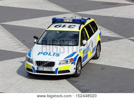 Stockholm, Sweden - June 24, 2014: Swedish police car a Volvo V70 parked at Sergel's Torg in Stockholm.