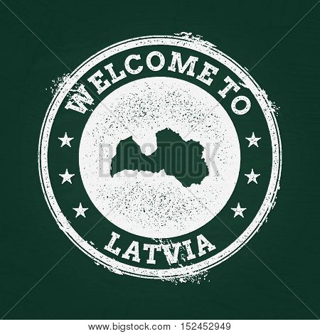 White Chalk Texture Retro Stamp With Republic Of Latvia Map On A Green Blackboard. Grunge Rubber Sea