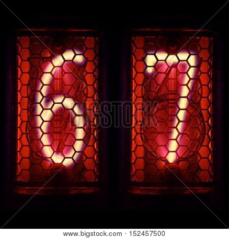 The  Nixie tube indicator of the numbers of retro style.  Digit 6, 7