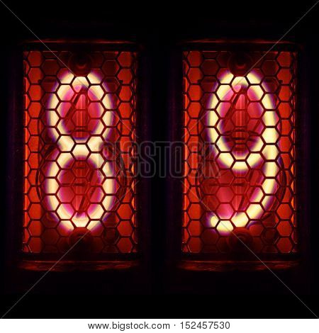 The Nixie tube indicator of the numbers of retro style.  Digit 8, 9
