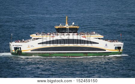 ISTANBUL TURKEY - JULY 30 2016: Sehir Hatlari ferry carry passengers between Asian and European sides of Istanbul. Sehir Hatlari was established in 1844 and now carry 150000 passengers a day.