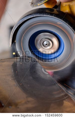 Cutting Steel With Angle Grinder At Car Service