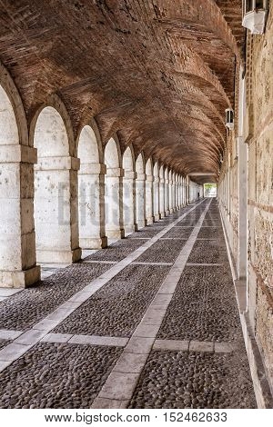Aranjuez Spain - October 16 2016: Arches and passageway at the Palacio Real Aranjuez located in the Royal Site and town of Aranjuez Madrid province Spain