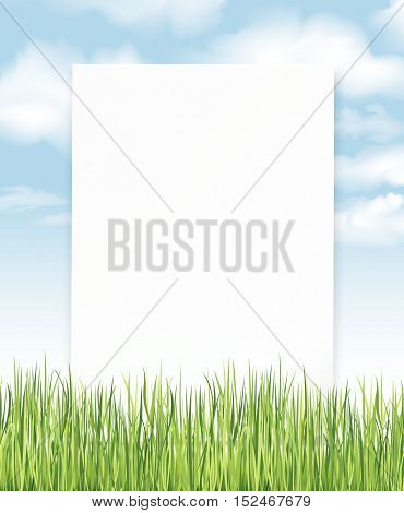 White paper sheet over summer background. Nature background with blue sky and meado grass