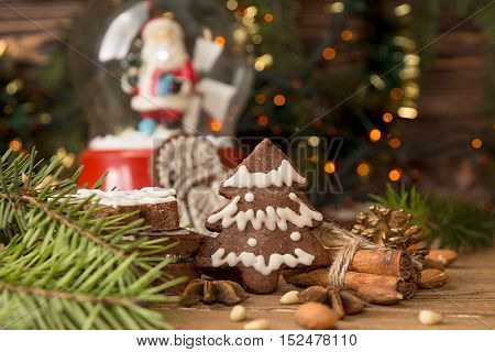 Christmas Gingerbread Cookies Against Background Branch Of Fir Tree