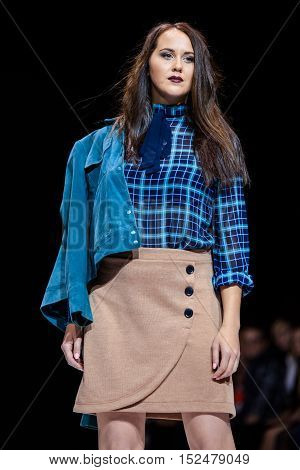 MOSCOW RUSSIA - OCTOBER 19 2016: Plus size model walk runway for LA REDOUTE & PLUS-SIZE MOSCOW catwalk at Spring-summer 2017 Moscow Fashion Week.