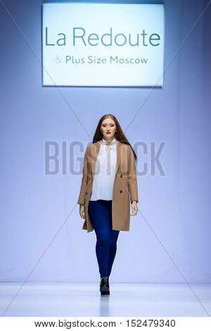MOSCOW RUSSIA - OCTOBER 19 2016: Plus size model walk runway for LA REDOUTE & PLUS-SIZE MOSCOW catwalk at Spring-summer 2017 Moscow Fashion Week.