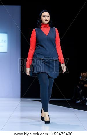 MOSCOW RUSSIA - OCTOBER 19 2016: Plus size model walk runway for LA REDOUTE & PLUS-SIZE MOSCOW catwalk at Spring-summer 2017 Moscow Fashion Week.
