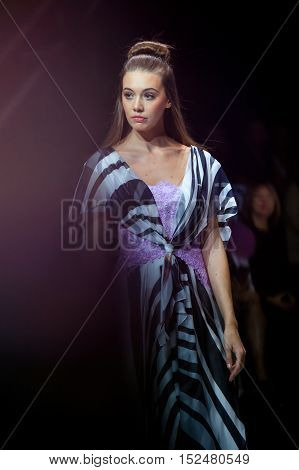 MOSCOW RUSSIA - OCTOBER 19 2016: Model walk runway for Olga Kunitsyna catwalk at Spring-summer 2017 Moscow Fashion Week.