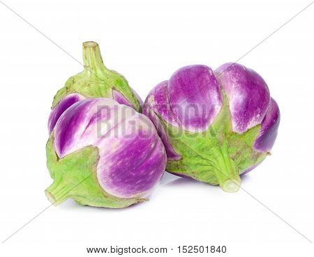 three purple eggplants isolated on whit background