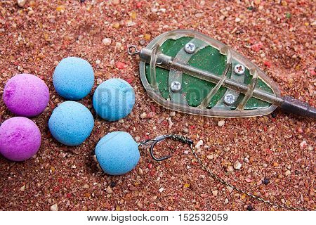 Dry Feed For Carp Fishing As Background. Ready For Use Carp Bait With Fishing Flat Feeder For Carp F
