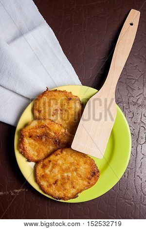 Potato Pancakes With Meat On Green Plate In Belarusian Style On Dark Background.