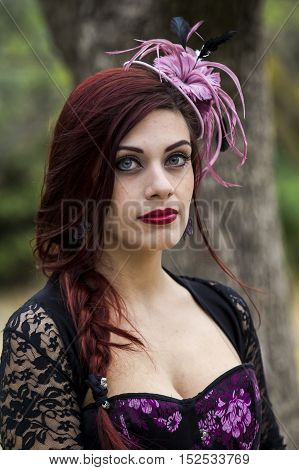 CAGLIARI, ITALY - June 1, 2014: Sunday at La Grande Jatte public gardens - Sardinia - portrait of a beautiful woman in Victorian costumes