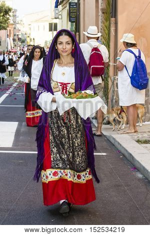 SELARGIUS, ITALY - September 11, 2016: Former marriage Selargino - Sardinia - portrait of a beautiful girl in traditional Sardinian costume